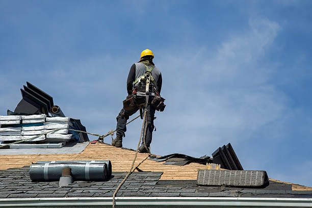 Professional Roofing technician working in West Roxbury, MA